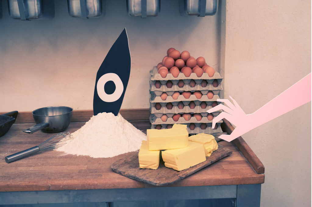Eggs, flour and butter on a table