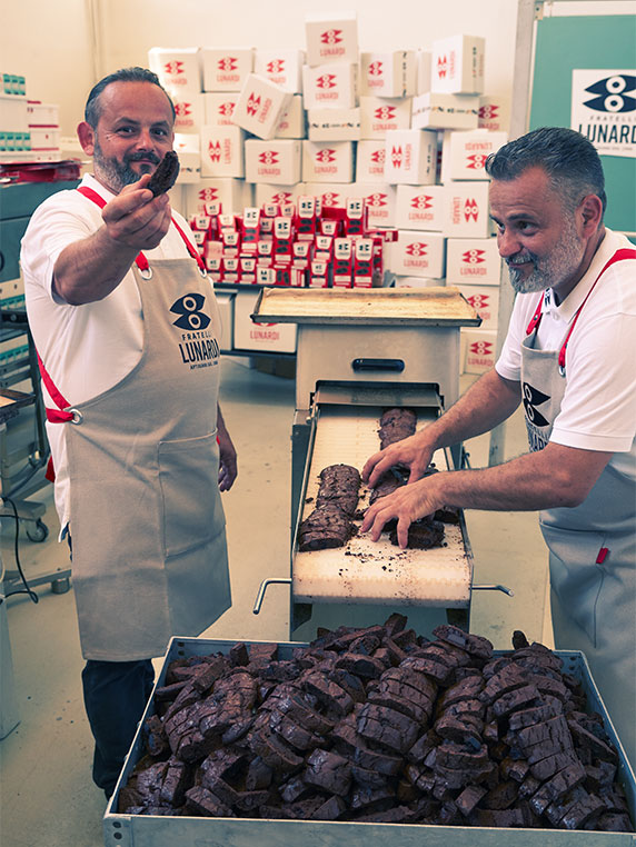 Massimiliano and Riccardo Lunardi with their chocolate biscuits