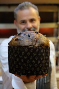 Massimiliano Lunardi showing his artisan panettone