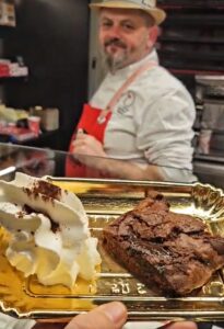 Fresh batches of hot chocolate cookies baked in view at Fratelli Lunardi in Florence